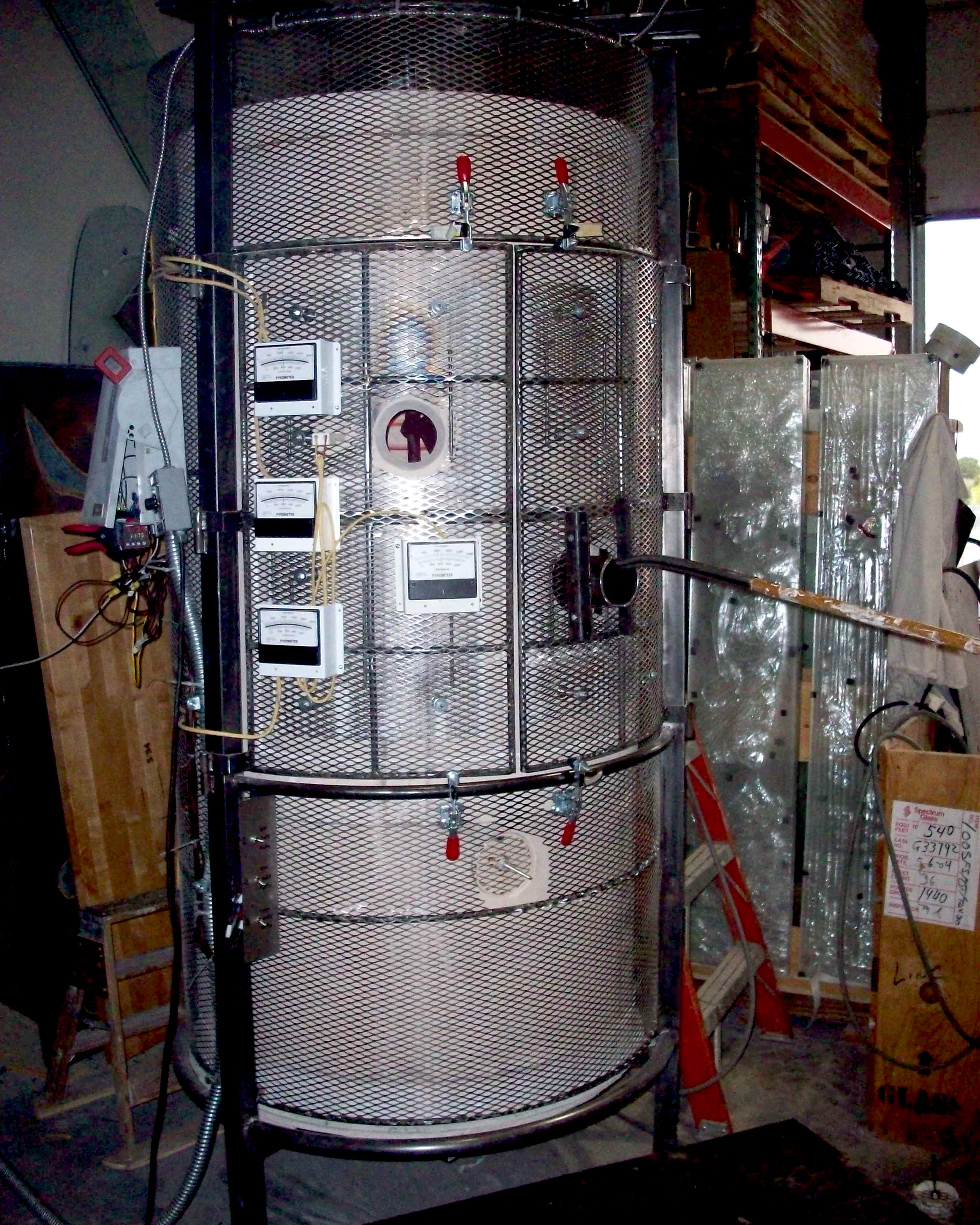 Completed custom-built high-temperature kiln with integrated instrumentation, viewing ports, and safety enclosure.