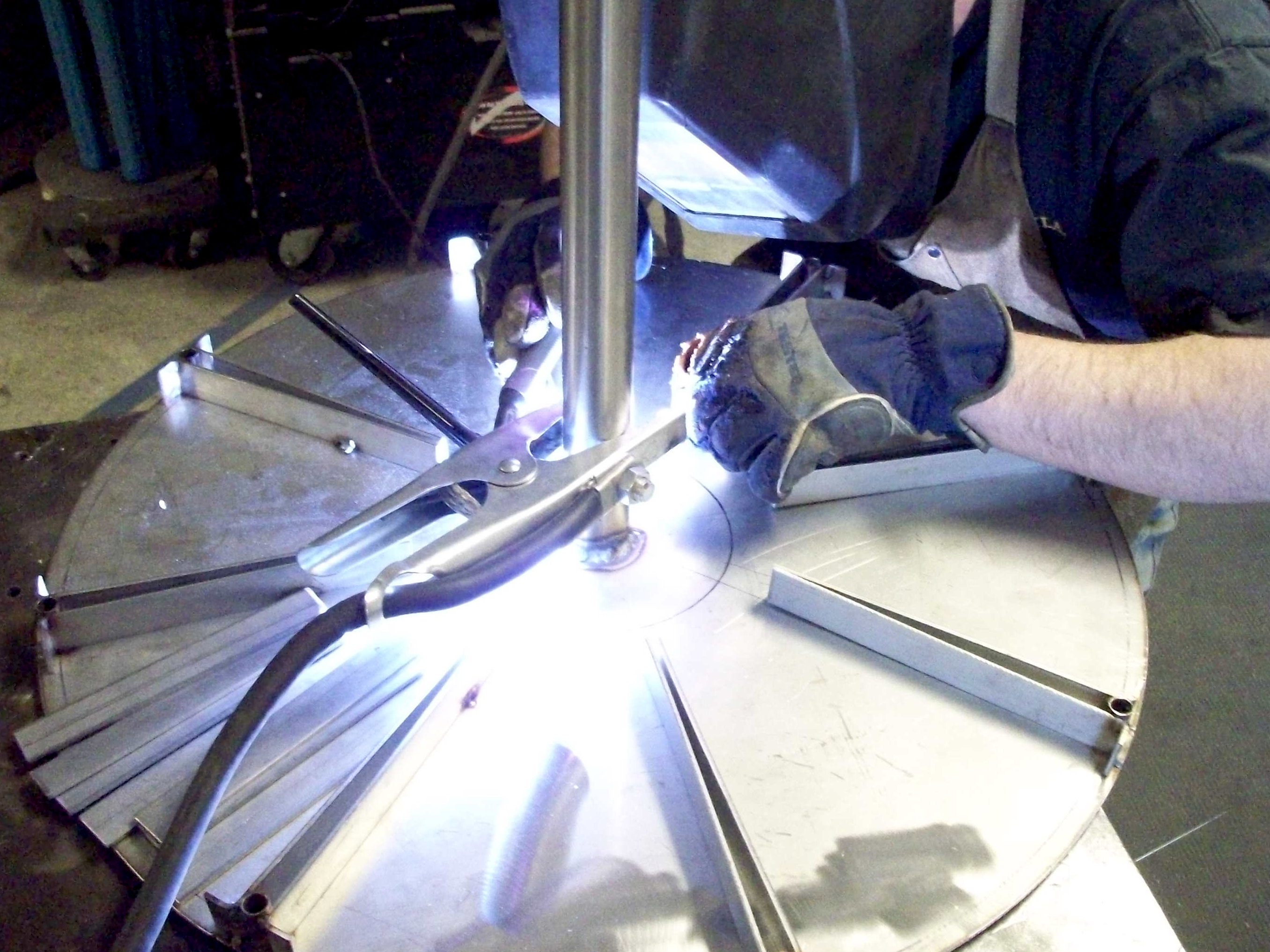 Fabrication of internal components during assembly, showing structural and mechanical details.